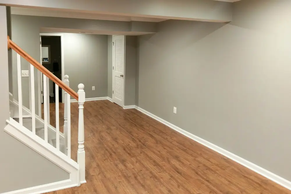 Basement Remodeling In Falls Church, Va 1 a room with a wood floor and a staircase