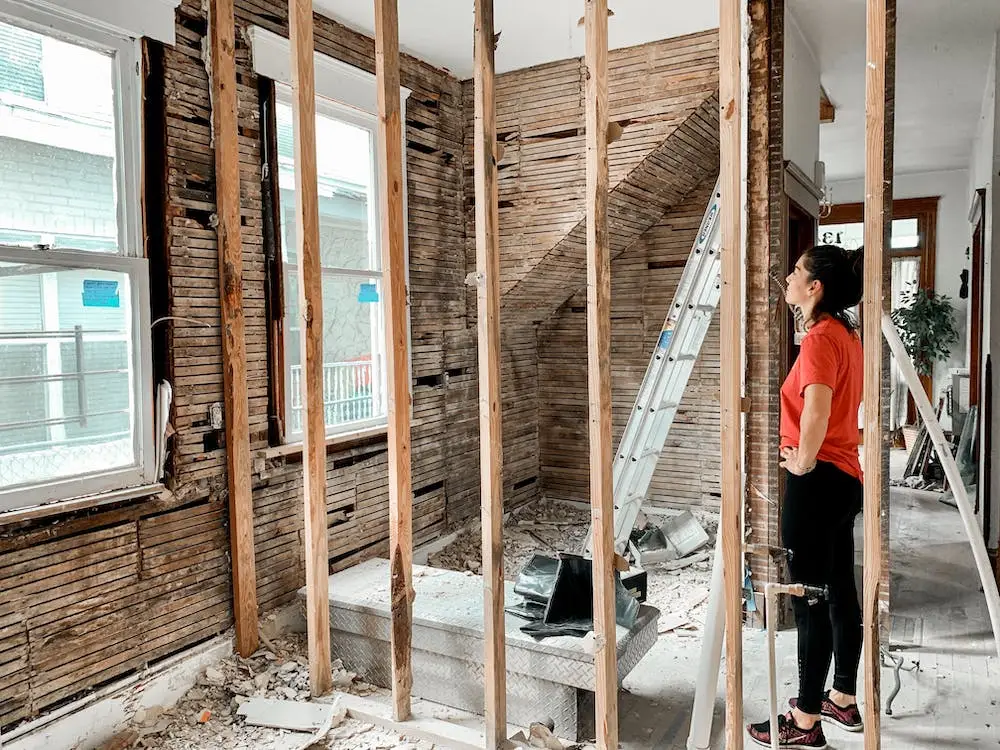 12 Questions You Need To Ask Your Custom Home Builder In Fairfax, Va, Before Hiring Them 5 woman thinking about home renovation ideas