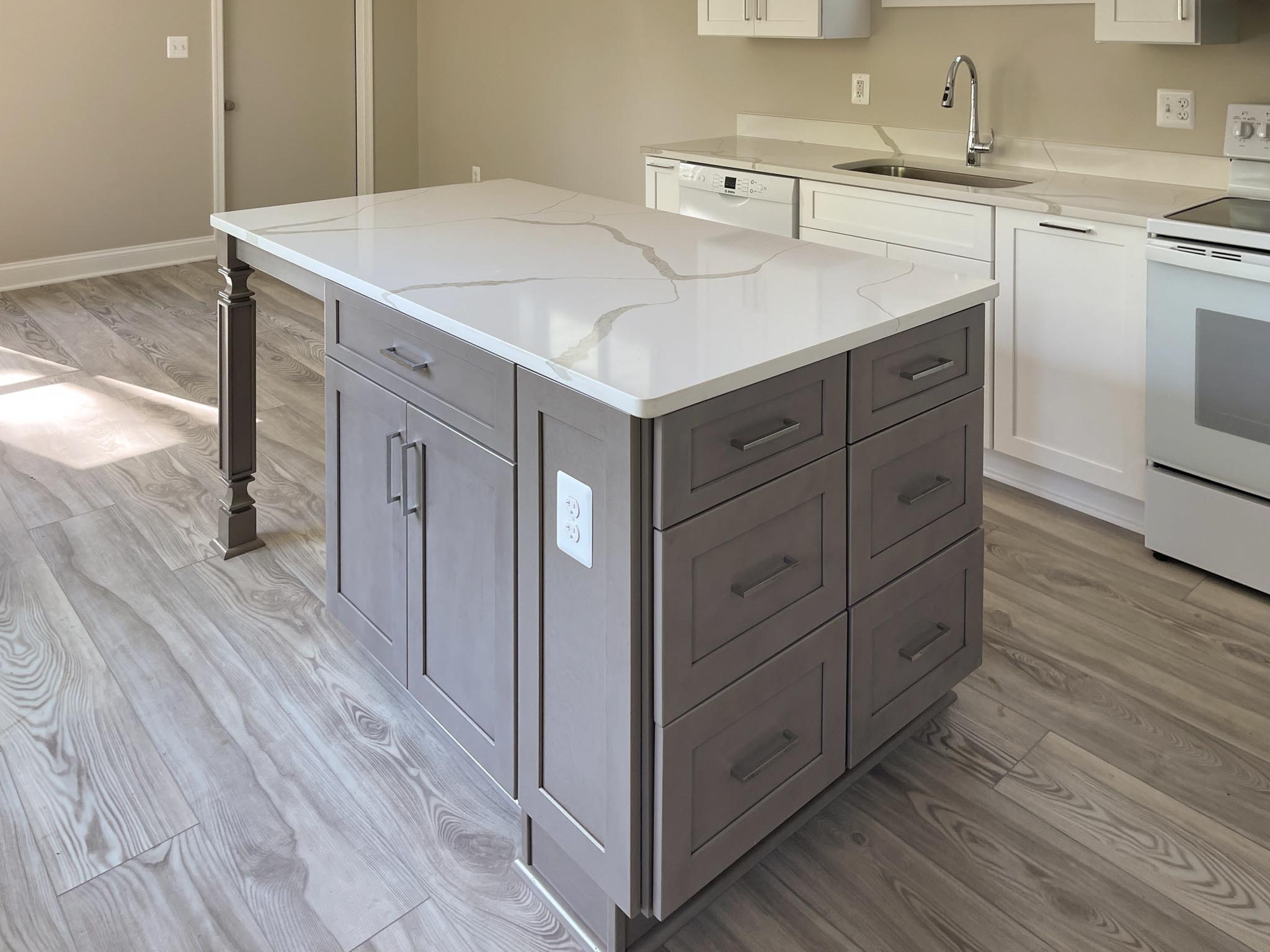 a kitchen island with 6 drawers